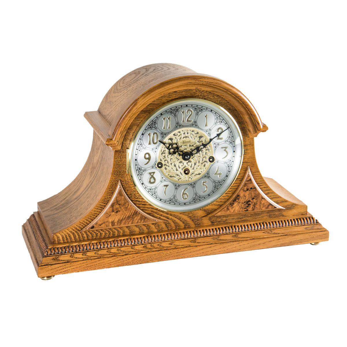 intricate face and holes for winding the mechanical movement inside on white background