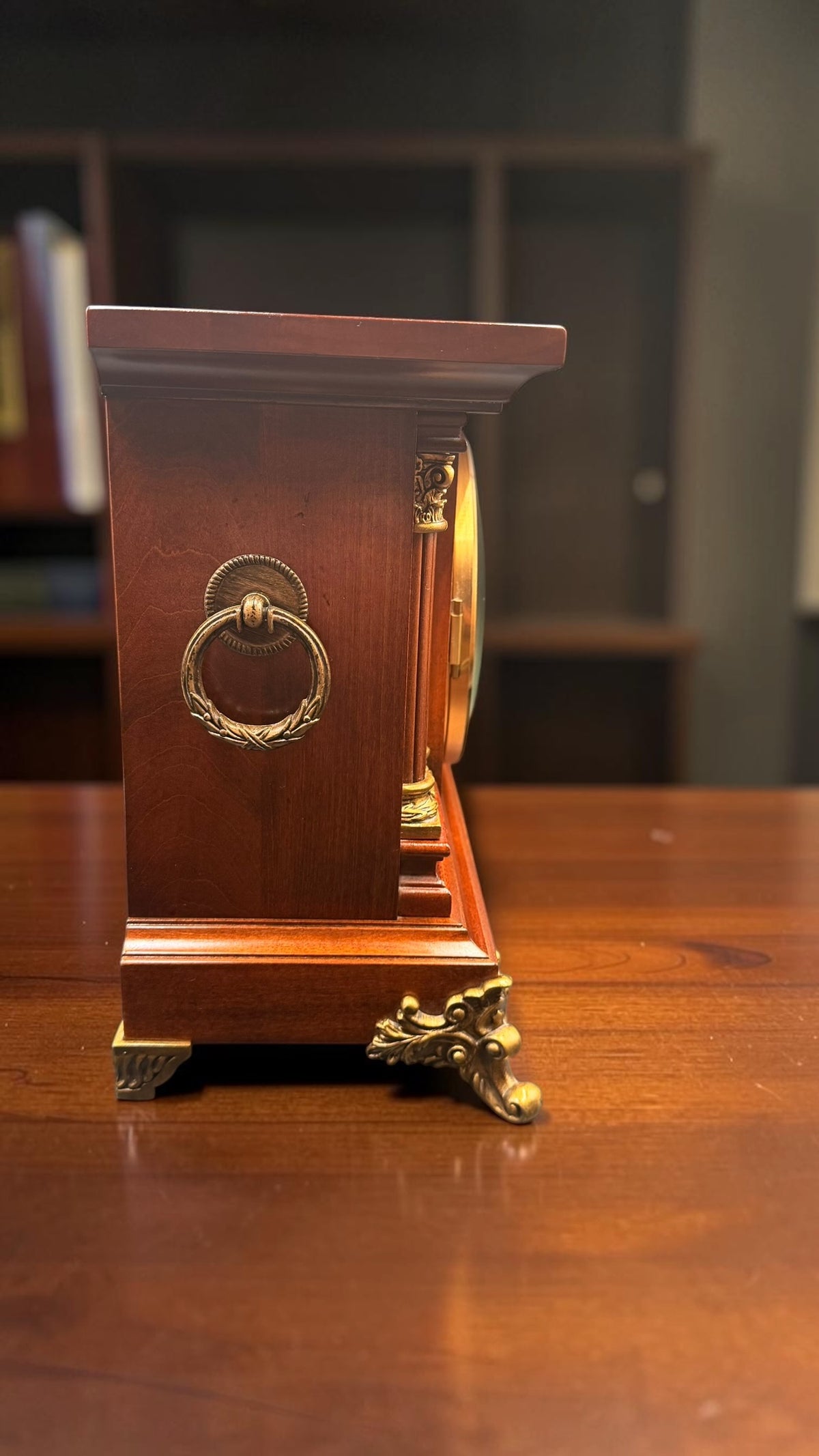 Decorative brass side ring on Howard Miller Circa mantel clock case