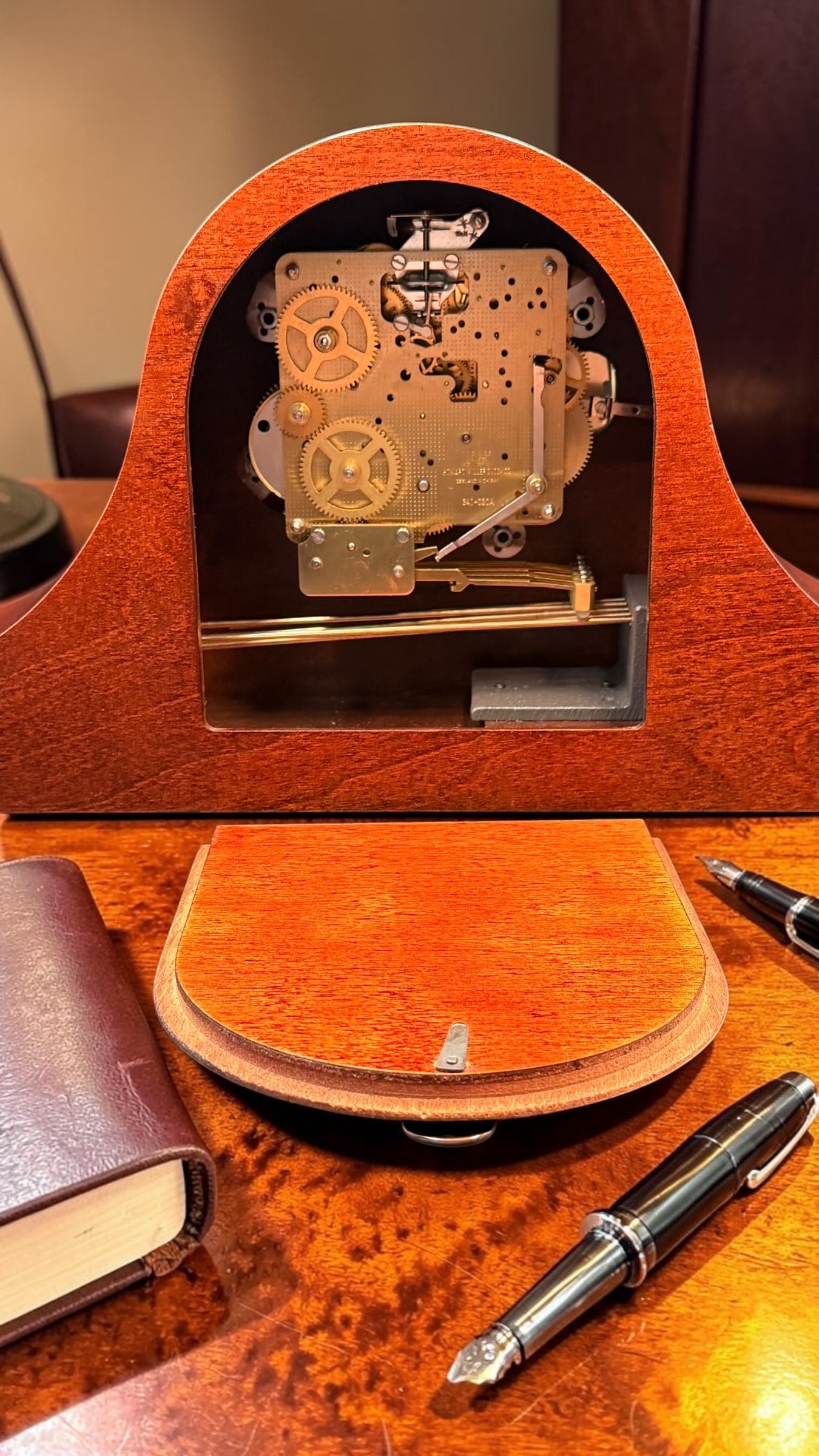 Howard Miller Ambassador 630-169 Mantel Clock – Mechanical Westminster Chime – German Hermle Movement – Key Wind – Burl Wood Tambour