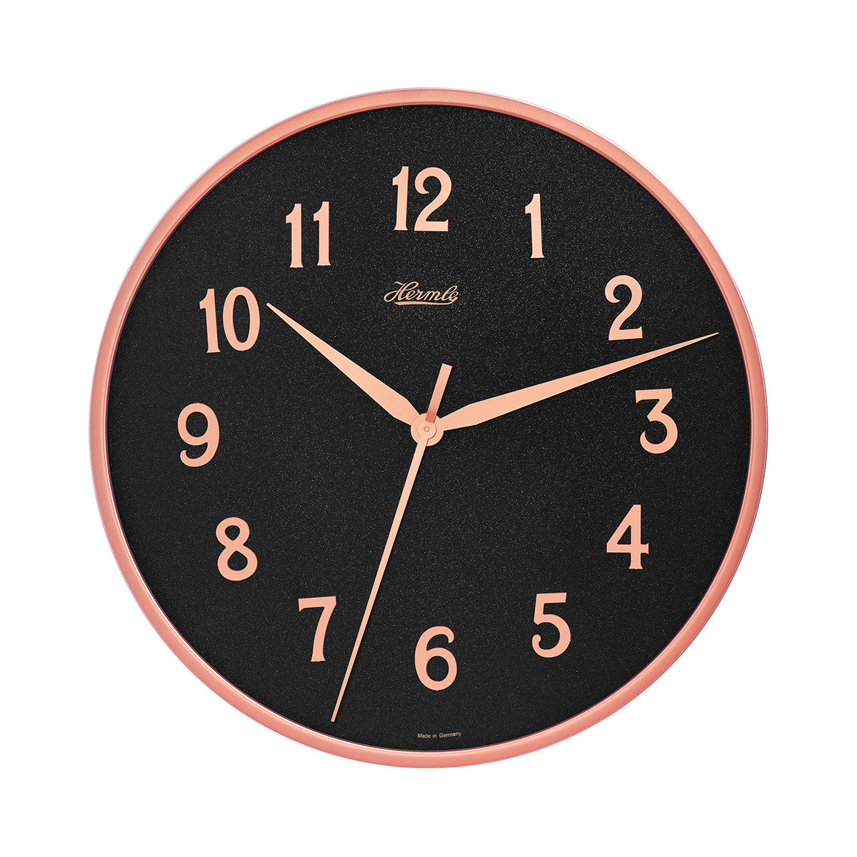 Wall clock with rose gold highlights and black face with Arabic numerals on white background.