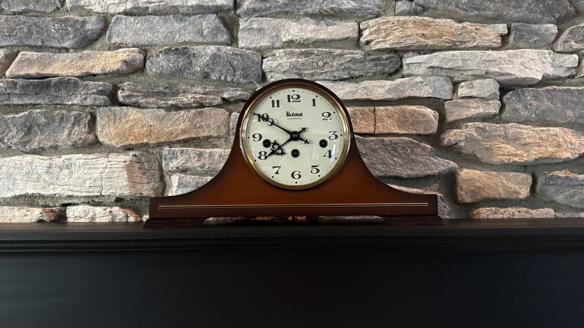 Gram’s curved Bulova Westminster mantel clock on Andy’s mantel.