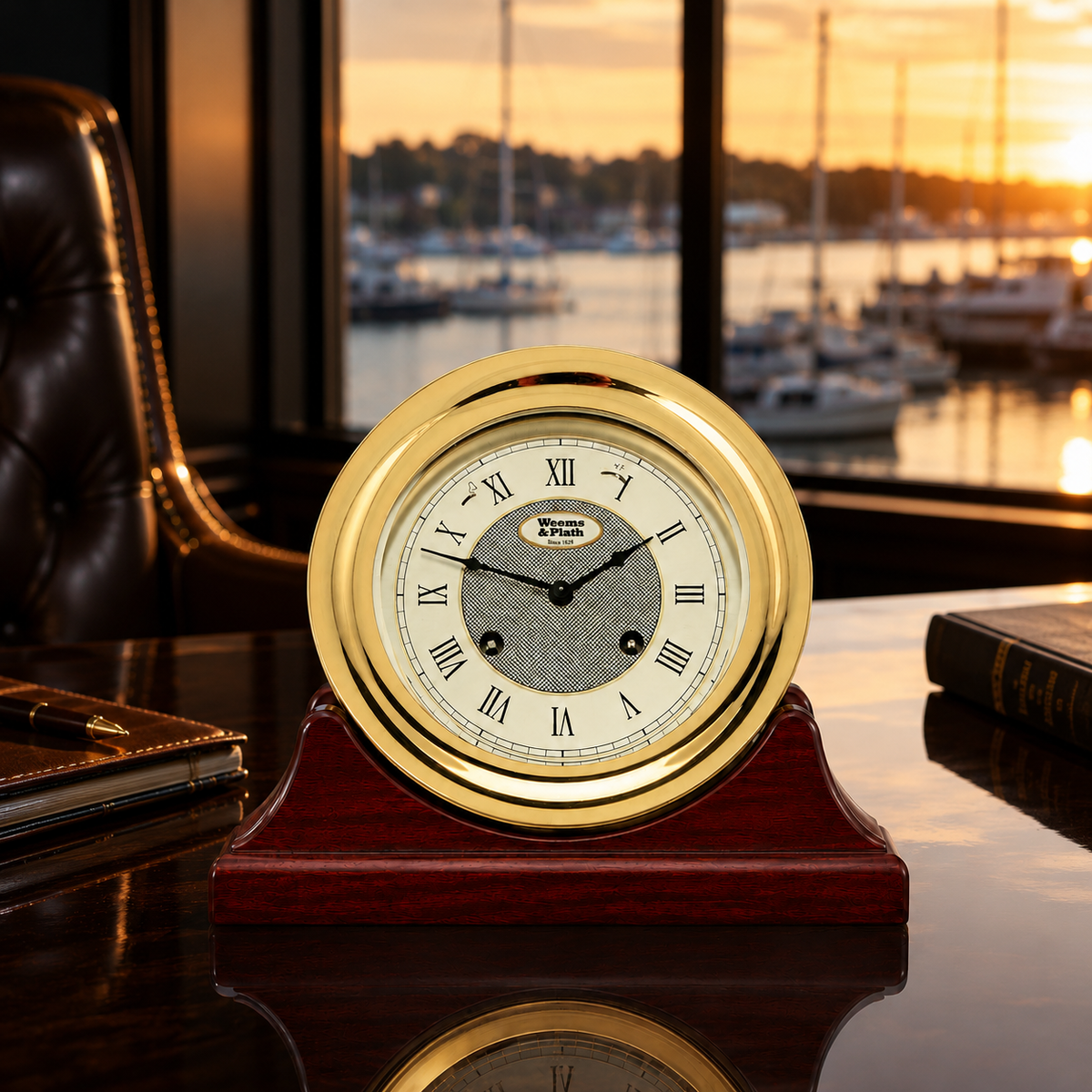 Weems & Plath Anniversary 8-Day Ship's Bell Clock on matching Weems & Plath mahogany base