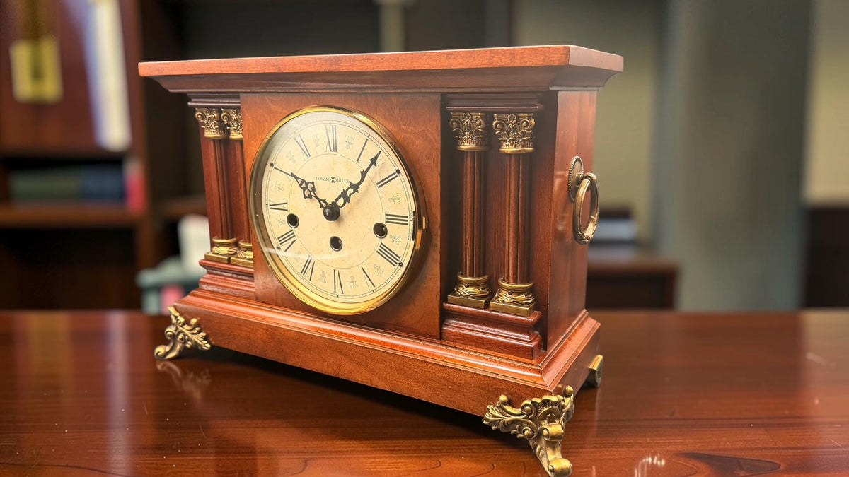 Three-quarter view of Howard Miller Circa traditional wooden mantel clock