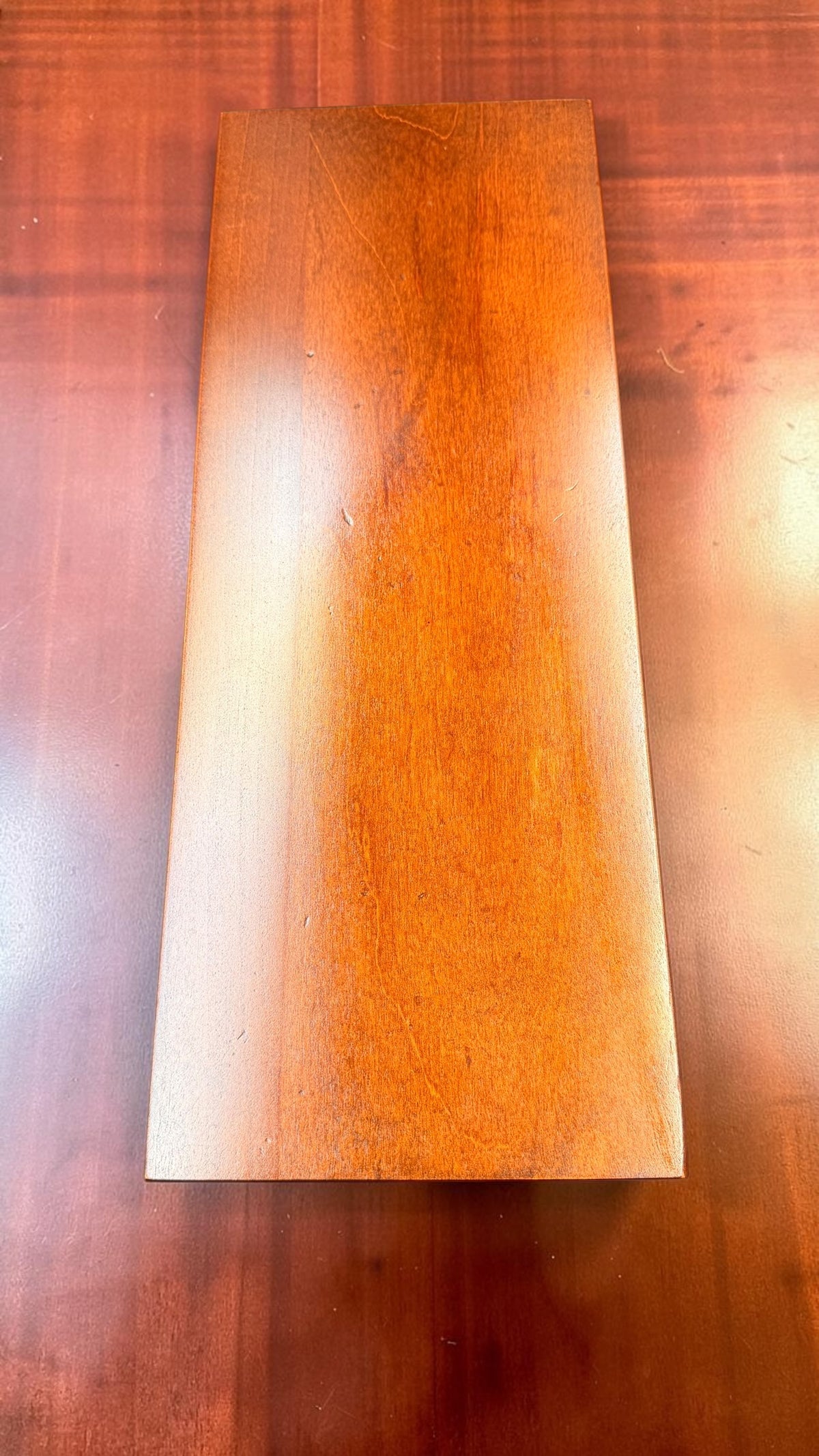 Underside wood surface of actual Howard Miller Circa clock